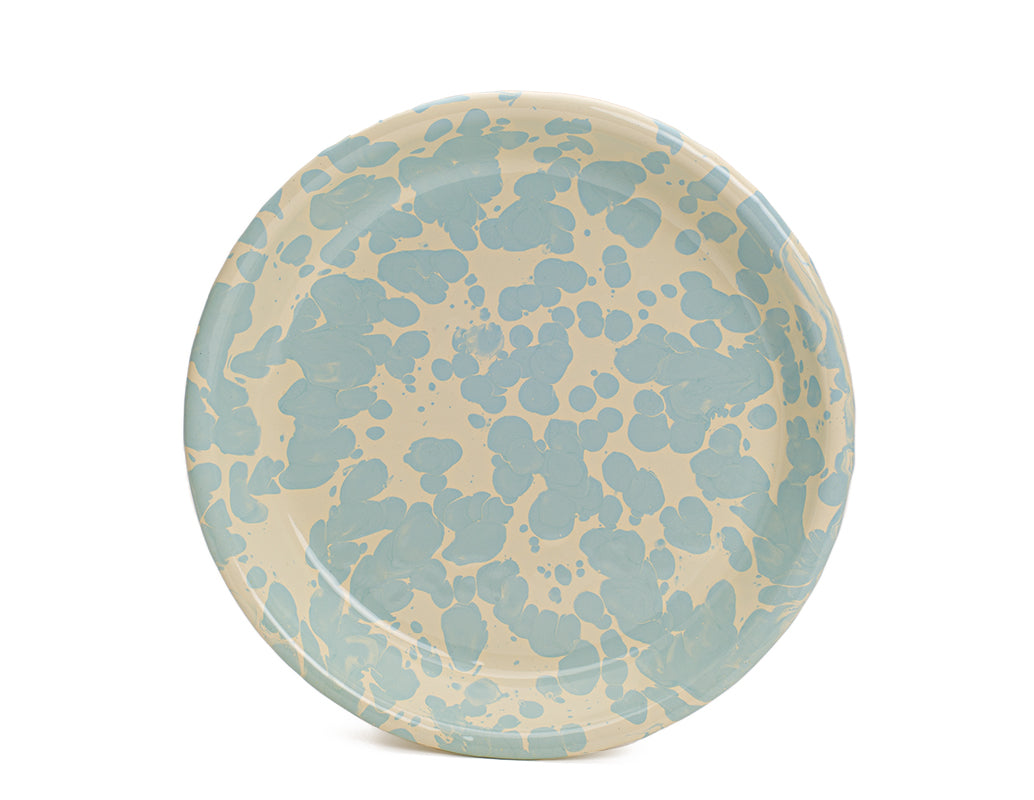 Plato hondo de peltre crema con manchas menta sin bordes