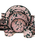 Vajilla de peltre verde con manchas rosas y borde negro para 4 personas
